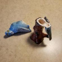 Broken bluebird figurine